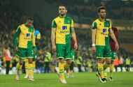 NORWICH, ENGLAND - MAY 11:  Norwich City players applaud supporters following relegation during the Barclays Premier League match between Norwich City and Watford at Carrow Road on May 11, 2016 in Norwich, England.  (Photo by Stephen Pond/Getty Images)